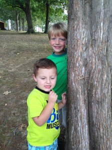Come up here & let me make your picture by this tree.