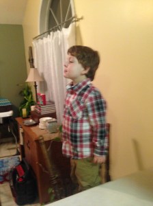 Meanwhile back at home, he's back to standing on the barstools, that swivel.  He's just talented like that.